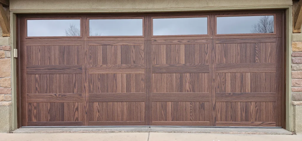 minimalist window inserts beautifully demonstrates the architectural warmth and premium presence of What Makes Custom Wood Garage Doors Unique