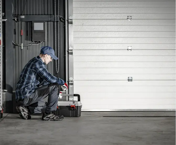 expert conducting emergency garage door repair